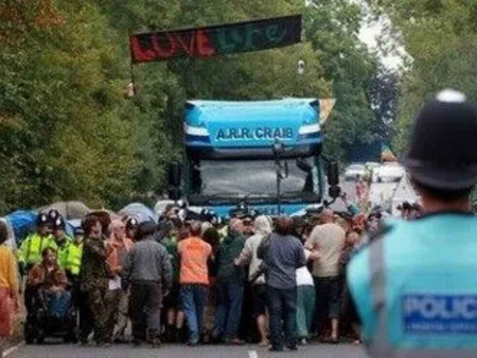 Crowd gathered at the entrance to the Cuadrilla fracking site in Balcombe