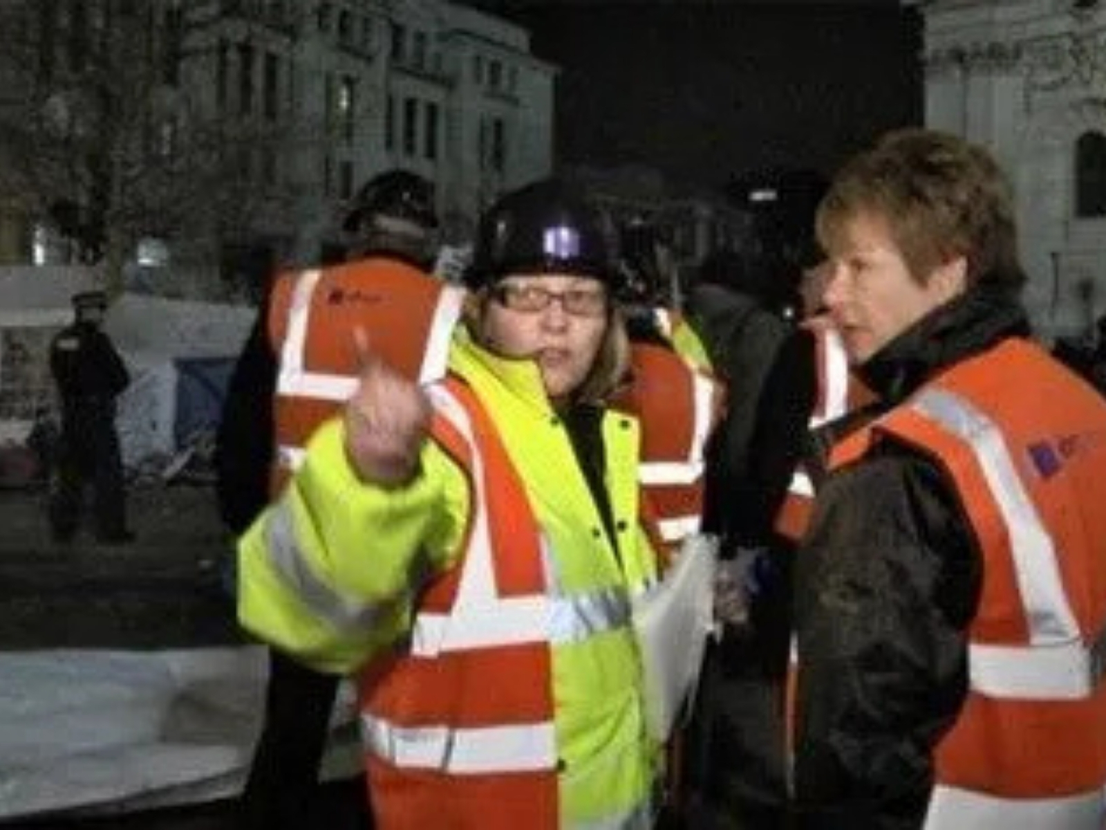 Officers in high-visibility jackets outside St Paul's Cathedral during the Occupy encampment